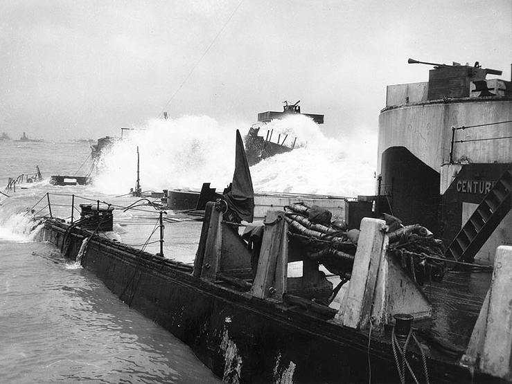 HMS_Centurion_as_breakwater_during_storm_off_Omaha_Beach_in_June_1944.jpg